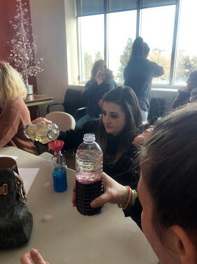 Participants try the Lava Lamp activity with their kids